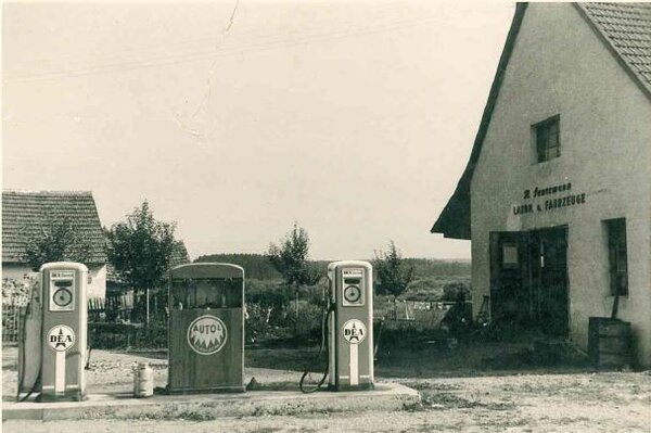 Hans Sauermann agricultural machinery dealership &amp; repair workshop with filling station